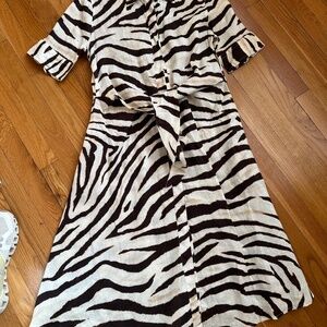 Zebra striped linen dress with detail at the waist